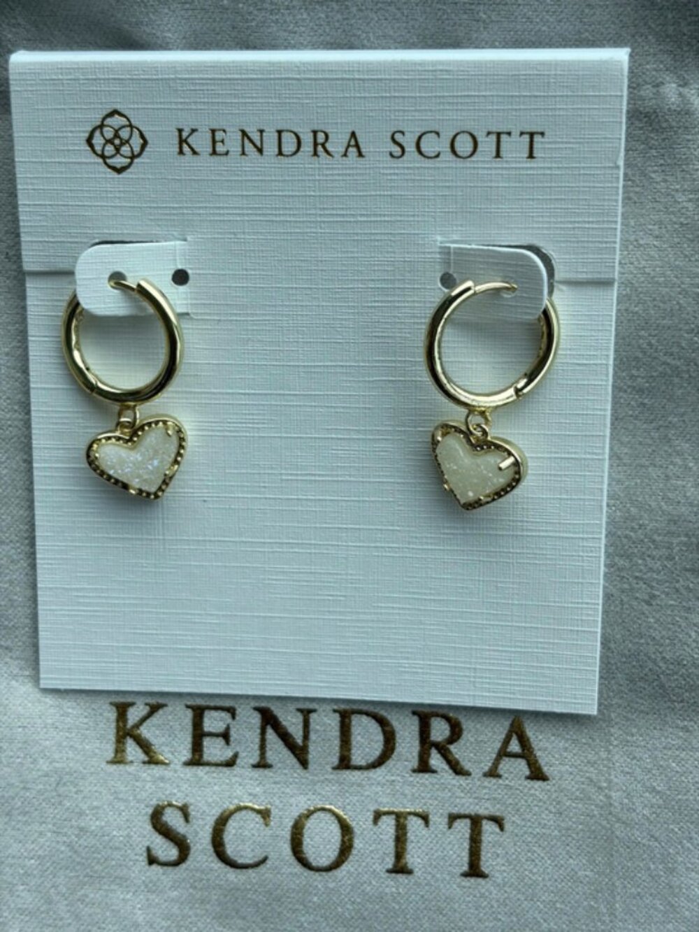 Kendra Scott white heart-shaped earrings
